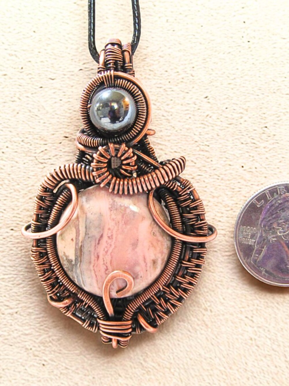 Handmade Rhodonite & Hematite Copper Wire Wrapped Pendant - Picture 4 of 4